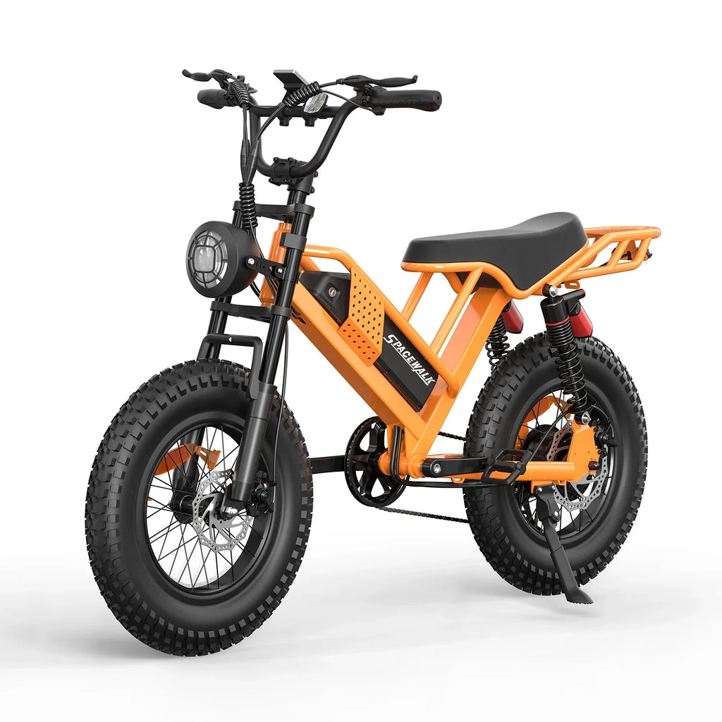 Orange electric bike with fat tires, front headlight, and rear cargo rack on white background