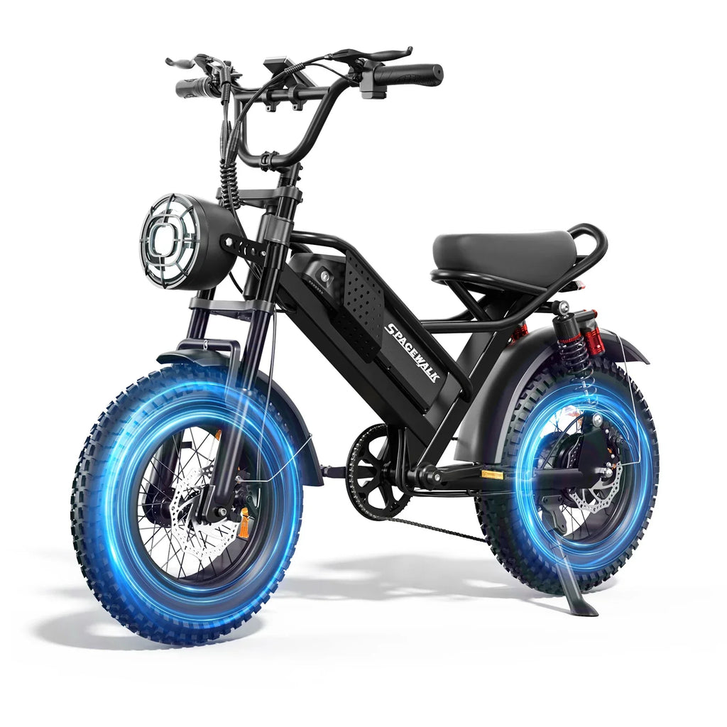 Black electric bike with thick all-terrain tires, front headlight, and rear suspension on white background
