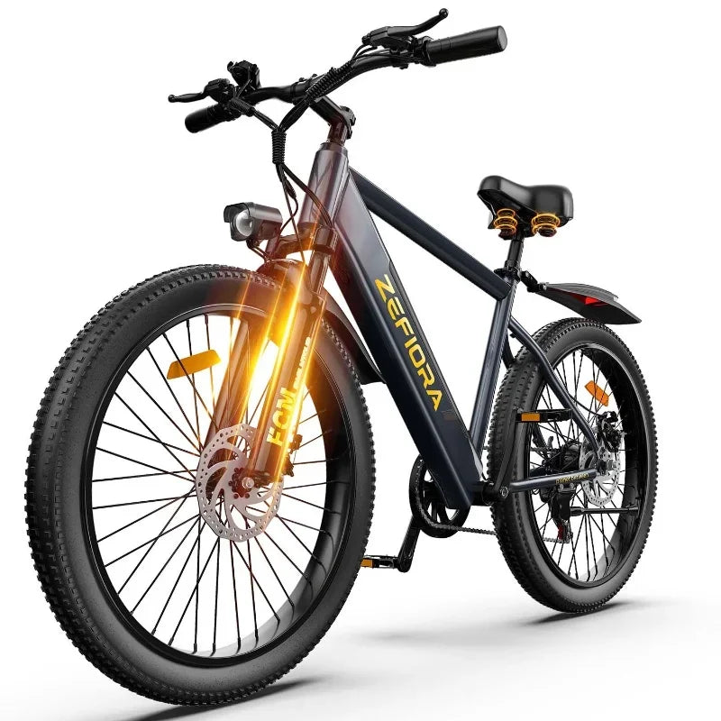 Electric mountain bike with thick tires, front suspension, and LED headlight on white background