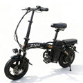 Folding black electric bike with thick tires, pedal assist, and rear cargo seat on white background