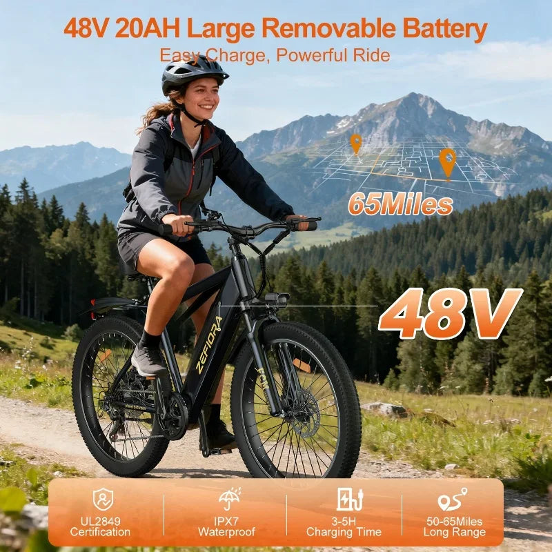 Woman riding electric mountain bike outdoors, highlighting 48V battery and 65-mile range